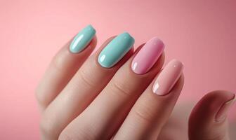 AI generated Female hand with pink and blue nail design. Nail polish manicure. photo