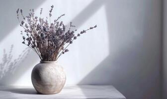 AI generated Lavender bouquet in vase on white table and wall background photo