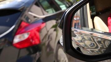 Blind Spot Monitoring system warning light icon in side view mirror of a modern vehicle. system blind spots of the car video