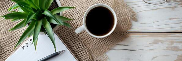 AI generated Minimalist desk setup with a potted plant, a cup of coffee, and neatly arranged office supplies, background image, generative AI photo