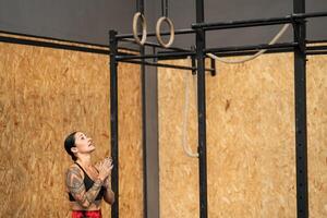 Athlete about to working out with olympic rings photo