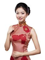 ai generado contento hermosa asiático mujer con vistiendo tradicional cheongsam vestir - generado imagen foto