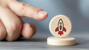 AI generated Hand reaching for wooden token with rocket icon photo