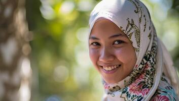 AI generated Portrait of young muslim woman with hijab smiling at camera. photo
