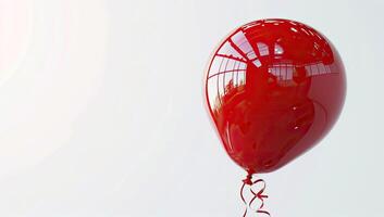 AI generated Red balloon on white background with copy space. photo