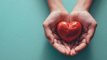 ai generado manos participación un rojo corazón en un verde antecedentes. el concepto de amor y salud. foto