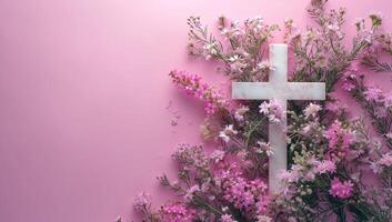 AI generated White cross with flowers on a pink background. Christian concept. photo