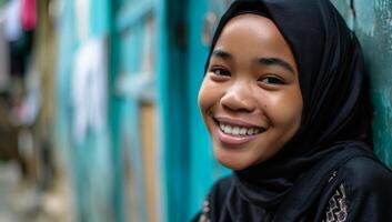 AI generated Portrait of a young muslim woman smiling at the camera. photo