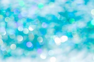 Lights on blue background. holiday bokeh. Abstract. Christmas background. Festive abstract background with bokeh defocused lights and stars photo