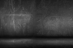 black board or chalkboard wall texture and dark studio room background photo