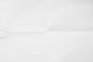 White sheet of paper folded texture photo