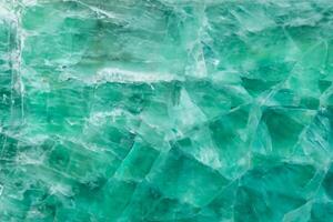 Green Fluorite stone background, natural texture in fresh color as part of your design work. photo