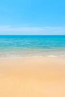 Blue sea water and sand beach photo
