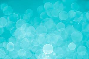 abstract aqua blue background with soft blur bokeh light effect photo