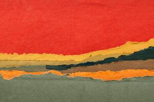 red sunset abstract landscape created with handmade Indian paper photo