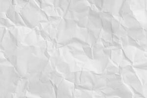 Crumpled white paper background photo