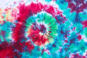 tie dye pattern hand dyed on cotton fabric abstract texture background. photo