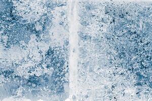 Ice blocks surface, blue toned. Ice texture background. Textured cold frosty surface of ice blocks. photo