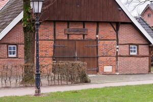 old house and church in westphalia photo