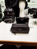 Paris, France, January 17, 2024 - PRADA bag in a showcase. photo