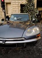 France, Paris, January 08, 2024 - Vintage Citroen DS on a road photo