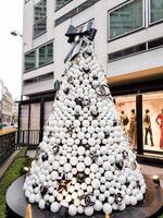 France, Paris, January 09, 2024 - Chanel facade and Christmas tree photo