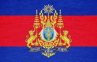 Flag and coat of arms of Kingdom of Cambodia on a textured background. Concept collage. photo