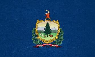 Flag of Vermont USA state on a textured background. Concept collage. photo