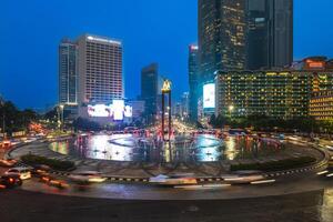 Selamat Datang Monument located at Hotel Indonesia roundabout in Central Jakarta, Indonesia. It was completed in 1962 by sculptor Edhi Sunarso. Selamat Datang is Indonesian Welcome. photo