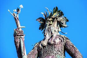 Wilder Mann Wild Man statue near the Grosses Festspielhaus in Salzburg, Austria Europe. photo