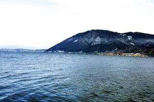 Landscape on Lake Traunsee in Salzkammergut in Upper Austria in winter. photo