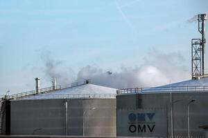 Vienna, Austria - 01.14.2024 Production buildings and pipes of the OMV oil refinery. photo