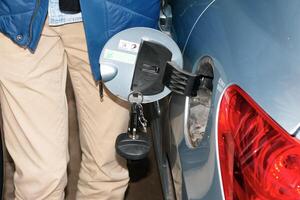 Bratislava, Slovakia - 01.12.2024 Refueling the car at a gas station fuel pump. photo