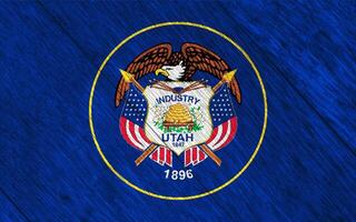 Flag of Utah USA state on a textured background. Concept collage. photo