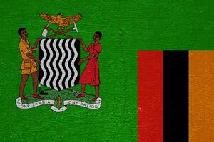 Flag and coat of arms of Republic of Zambia on a textured background. Concept collage. photo