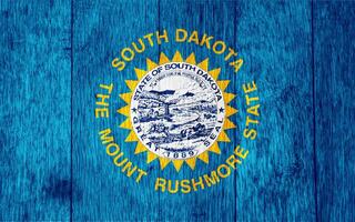 Flag of South Dakota USA state on a textured background. Concept collage. photo