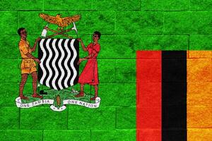 Flag and coat of arms of Republic of Zambia on a textured background. Concept collage. photo