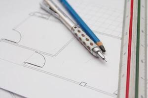 Pencils and ruler on a construction plan, close-up, architect, architecture,drawing architect. photo