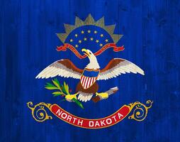 Flag of North Dakota state USA on a textured background. Concept collage. photo
