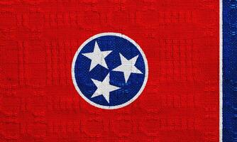 Flag of Tennessee state USA on a textured background. Concept collage. photo