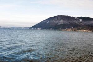 Landscape on Lake Traunsee in Salzkammergut in Upper Austria in winter. photo