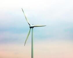 Wind turbine station windmill park next to the road in Austria in cloudy weather. photo