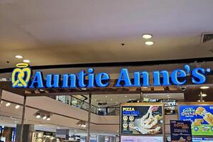 BANGKOK, THAILAND SEPTEMBER 05, 2023 Auntie Annes Sign. Auntie Annes is an American franchised chain of pretzel shops that was founded in 1988. photo