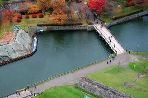 Top View of Nino Bridge to Goryokaku park in Autumn Day. photo