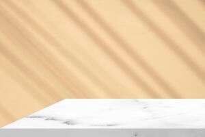 White Marble Table with Tree Shadow on Concrete Wall Texture Background in Peach Color, Suitable for Product Presentation Backdrop, Display, and Mock up. photo