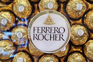 BANGKOK, THAILAND SEPTEMBER 07, 2023 Ferrero Rocher label on the Box. Ferrero Rocher is is a famous chocolate and hazelnut confectionery, introduced in 1982. photo