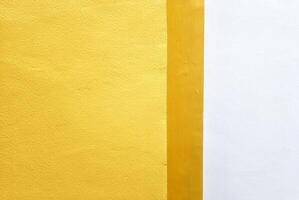 Minimal Two Tone Yellow and White Concrete Wall Background. photo