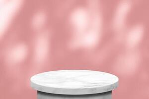 White Round Marble Table with Tree Shadow in the Garden on Pink Concrete Wall Texture Background, Suitable for Product Presentation Backdrop, Display, and Mock up. photo