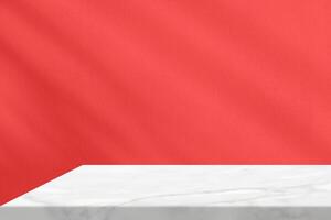 Minimal White Marble Table Corner with Light Beam, Shadow, and Spotlight on the Red Concrete Wall Background, Suitable for Product Presentation Backdrop, Display, and Mock up. photo