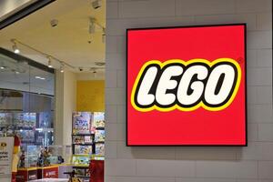 BANGKOK, THAILAND AUGUST 14, 2023 LEGO sign. LEGO is a Danish toy production company based in Billund, Denmark. photo